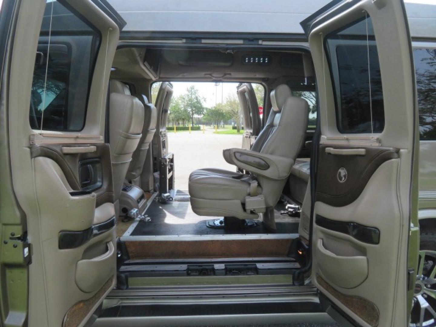 2013 /Beige Two Tone GMC Savana RV G1500 3LT (1GDS7DC45D1) with an 5.3L V8 OHV 16V engine, 4-Speed Automatic transmission, located at 4301 Oak Circle #19, Boca Raton, FL, 33431, (954) 561-2499, 26.388861, -80.084038 - You are looking at a Gorgeous 2013 GMC Savana 1500 High Top Conversion Van Explorer Limited SE Package Handicap Wheelchair Conversion Van with 72K Original Miles, Side Entry Braun Millennium Series Wheelchair Lift, Rubber Floor, Q-Straint Tie Down System, Navigation, Back Up Camera, Huge flat Screen - Photo#60